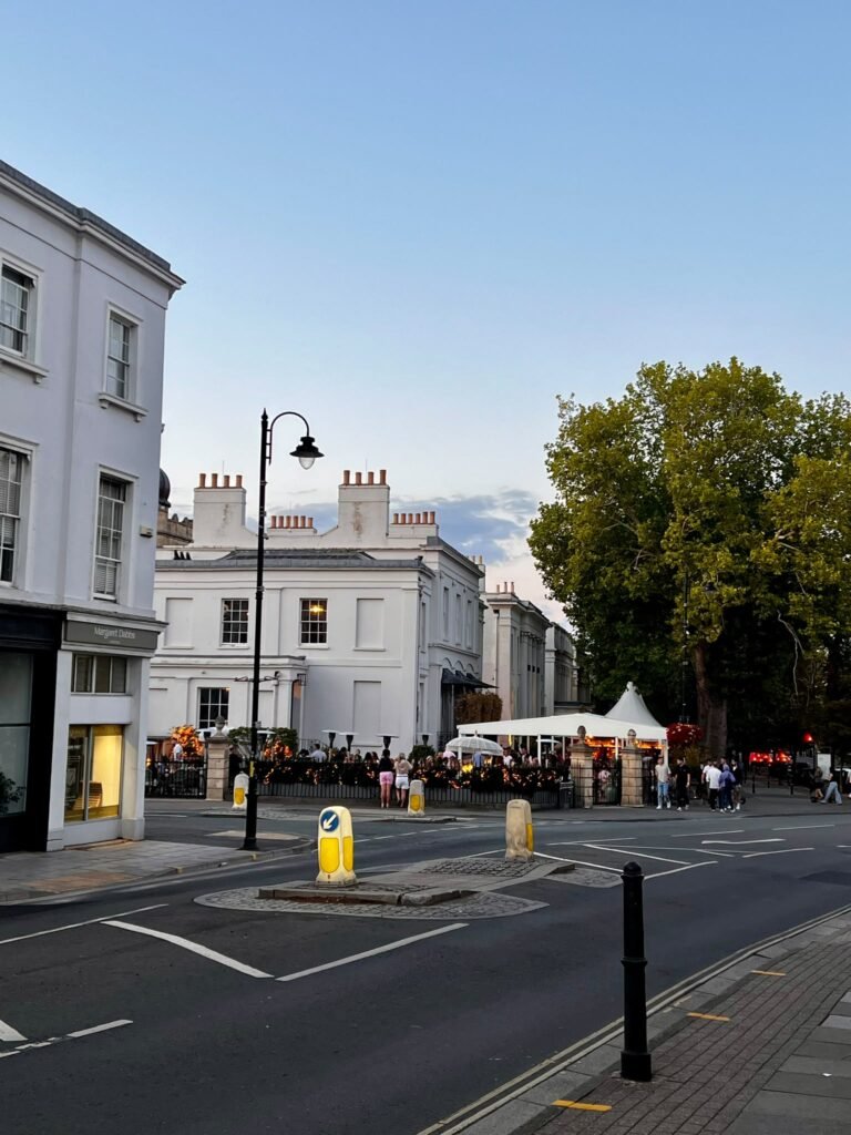 People gathering outside bars and restaurants in Cheltenham in the evening