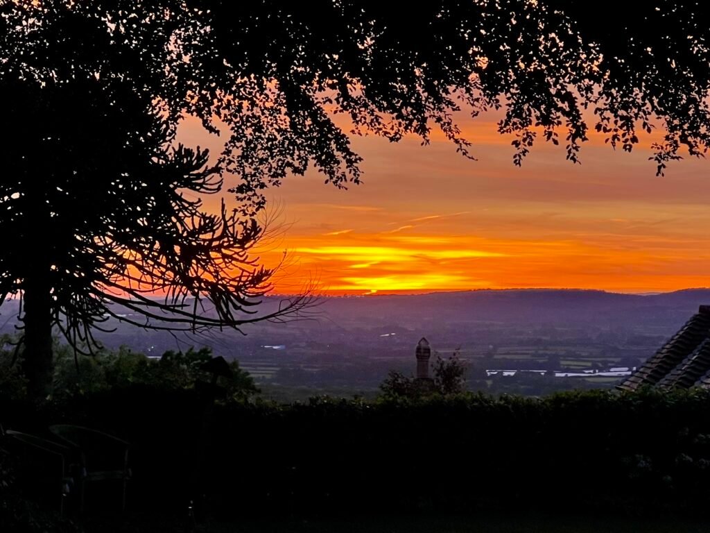 Orange sunset over the Dorset countryside viewed from Shaftesbury