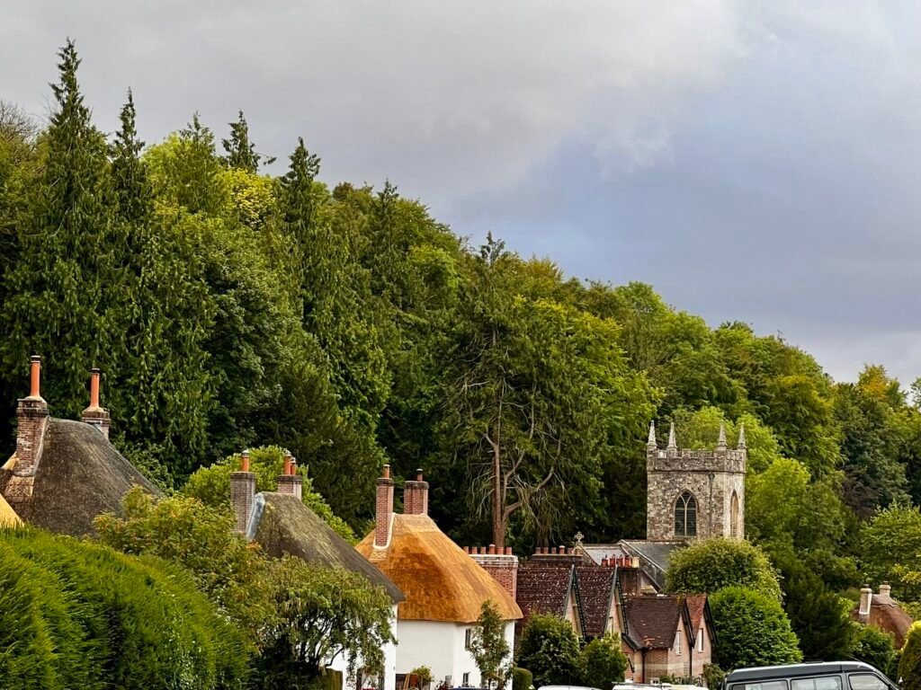 Milton Abbas Dorset with thatched cottages and St James’ Church
