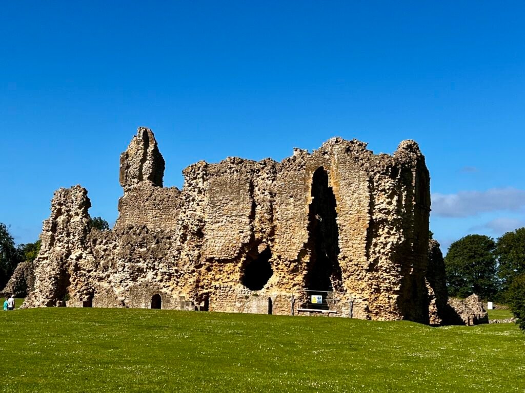 Sherborne Old Castle ruins beneath a blue sky in Dorset