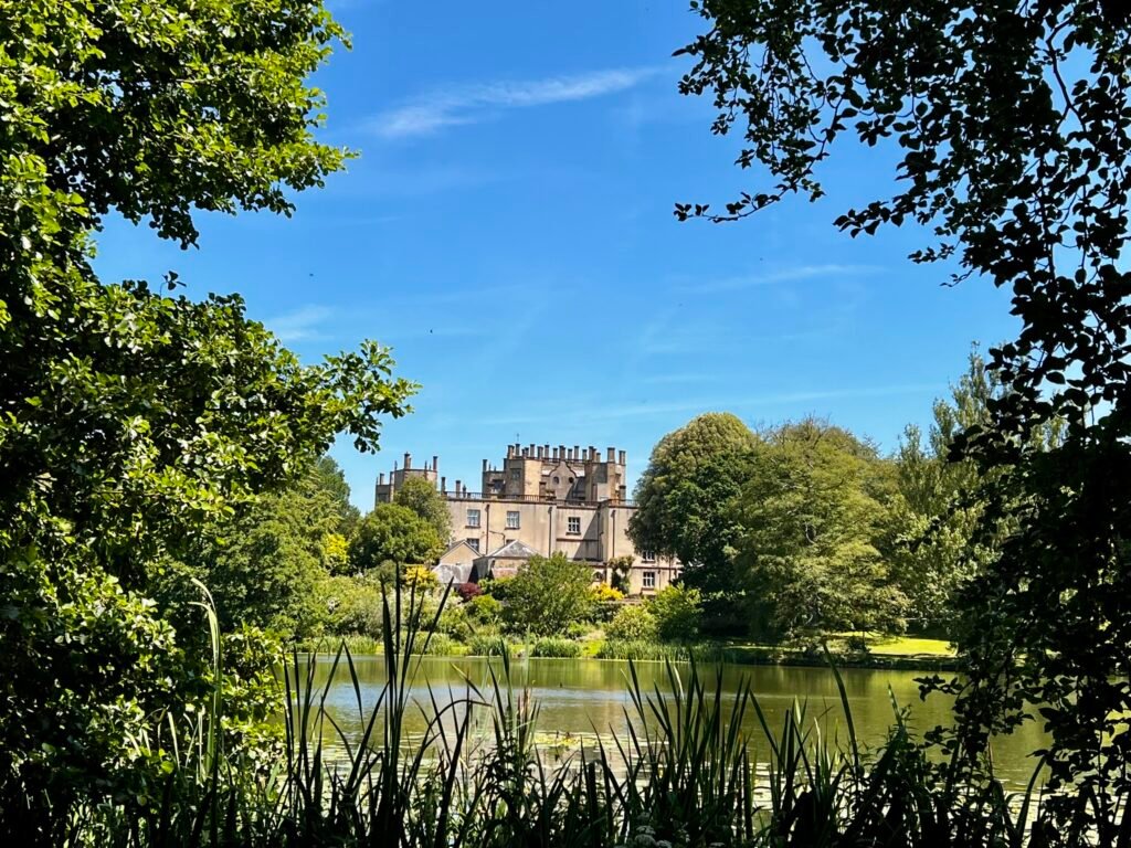 Sherborne Castle across the lake during a visit to Sherborne Castle and Sherborne Old Castle