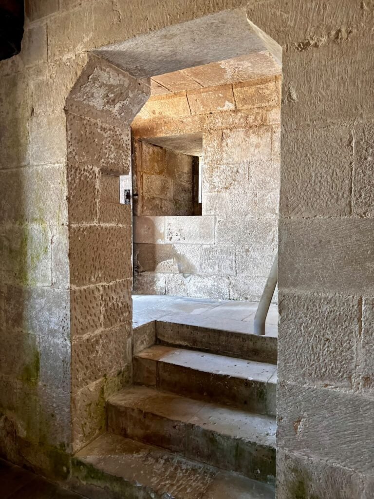Short stone staircase and doorway inside Portland Castle