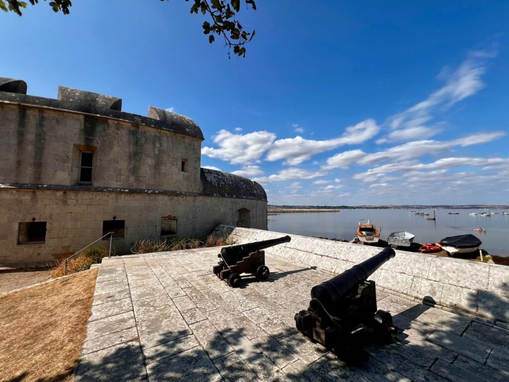 Portland Castle with historic cannons overlooking Portland Harbour in Dorset