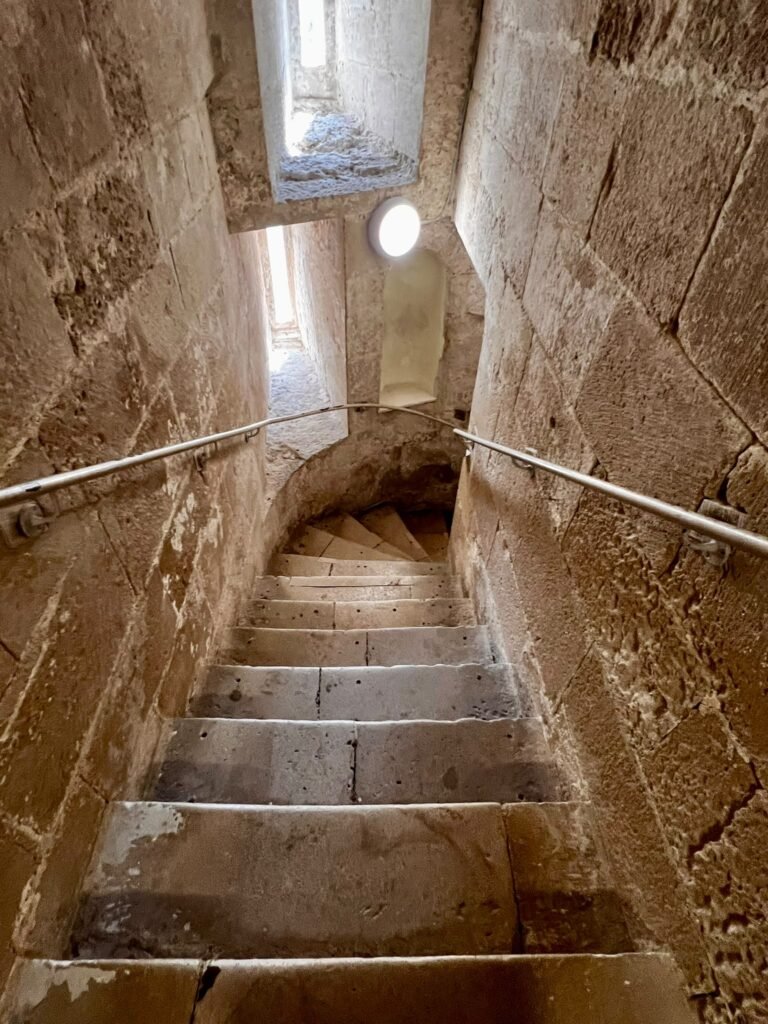 Narrow stone staircase inside Portland Castle