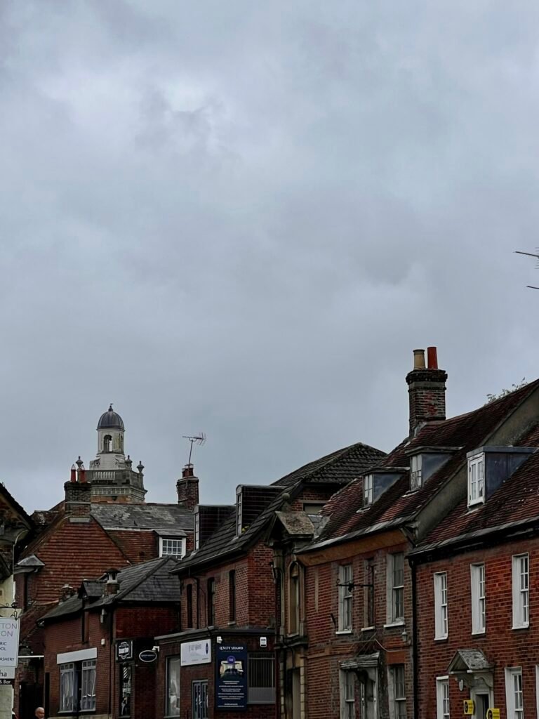 Red-brick historic buildings and rooftops in Blandford Forum town centre
