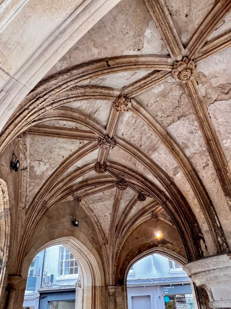 Stone rib-vaulted ceiling beneath the historic Chichester Cross