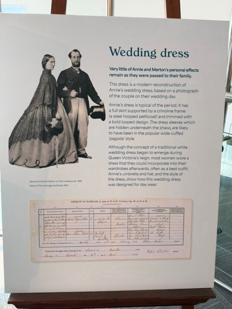 Museum panel showing the 1860 wedding photograph and marriage certificate of Annie and Merton Russell-Cotes