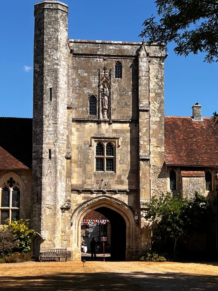 Medieval Beaufort Tower and arched gateway at the Hospital of St Cross in Winchester.
