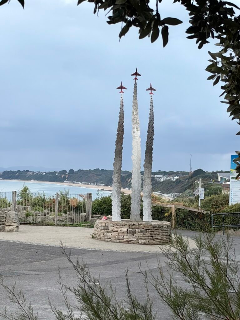 Jon Egging Memorial sculpture overlooking Bournemouth Bay from East Cliff