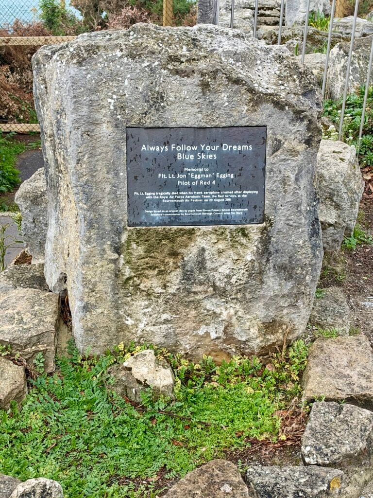Stone memorial to Red Arrows pilot Jon Egging with an inscription about following dreams