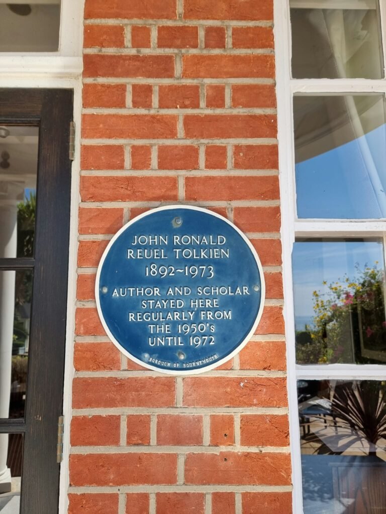 Blue plaque commemorating J.R.R. Tolkien's stays at Hotel Miramar in Bournemouth.