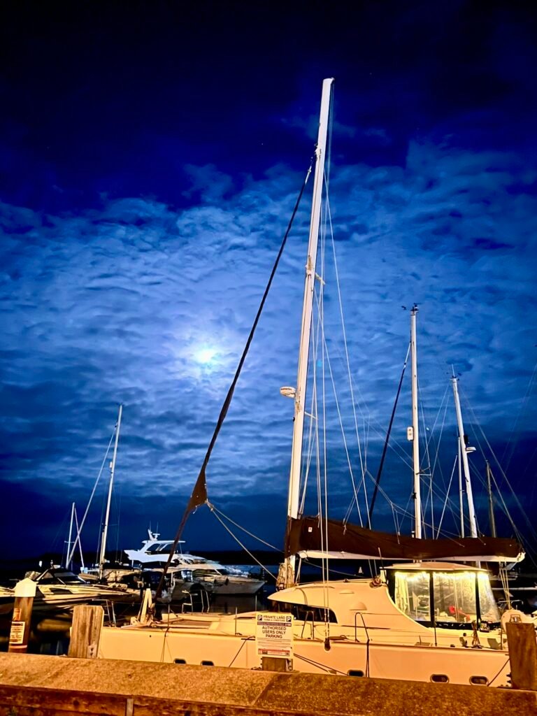 Moonlit yachts at Poole Harbour – free things to do near Bournemouth