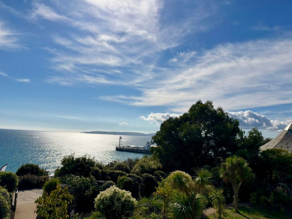 View across Russell-Cotes gardens towards Bournemouth Pier and the sparkling sea