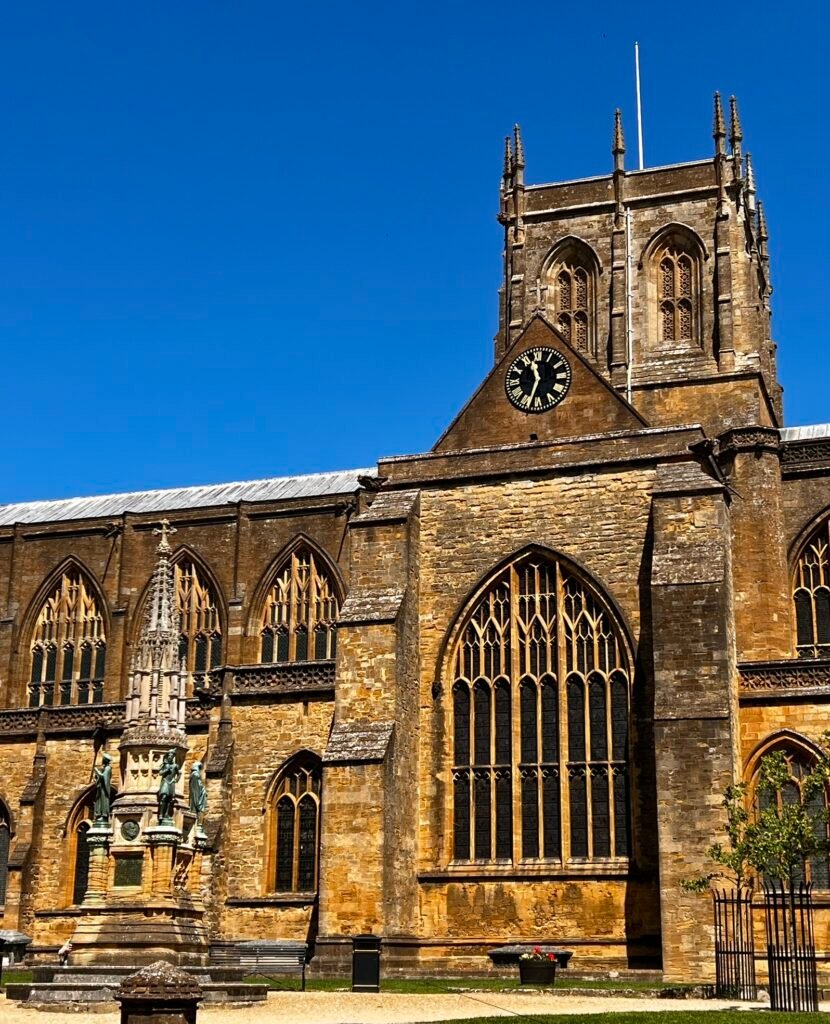 Sherborne Abbey in Dorset with the Digby Memorial in Abbey Close