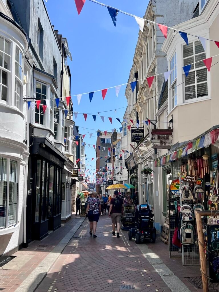 Old town street in Weymouth decorated with bunting near the harbour